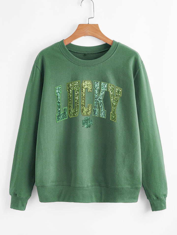 Sweatshirt décontracté pour femmes avec lettrage étincelant et motif de trèfle Chic & Stil