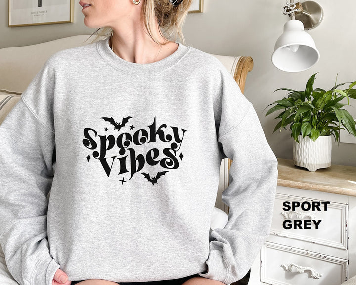 Sweat à capuche pour femmes avec un design Halloween ludique et une coupe confortable Chic & Stil