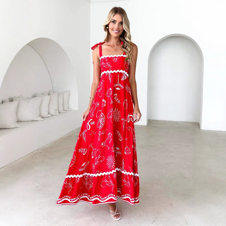 Maxi dress for women with a playful strap design and a chic & stylish print