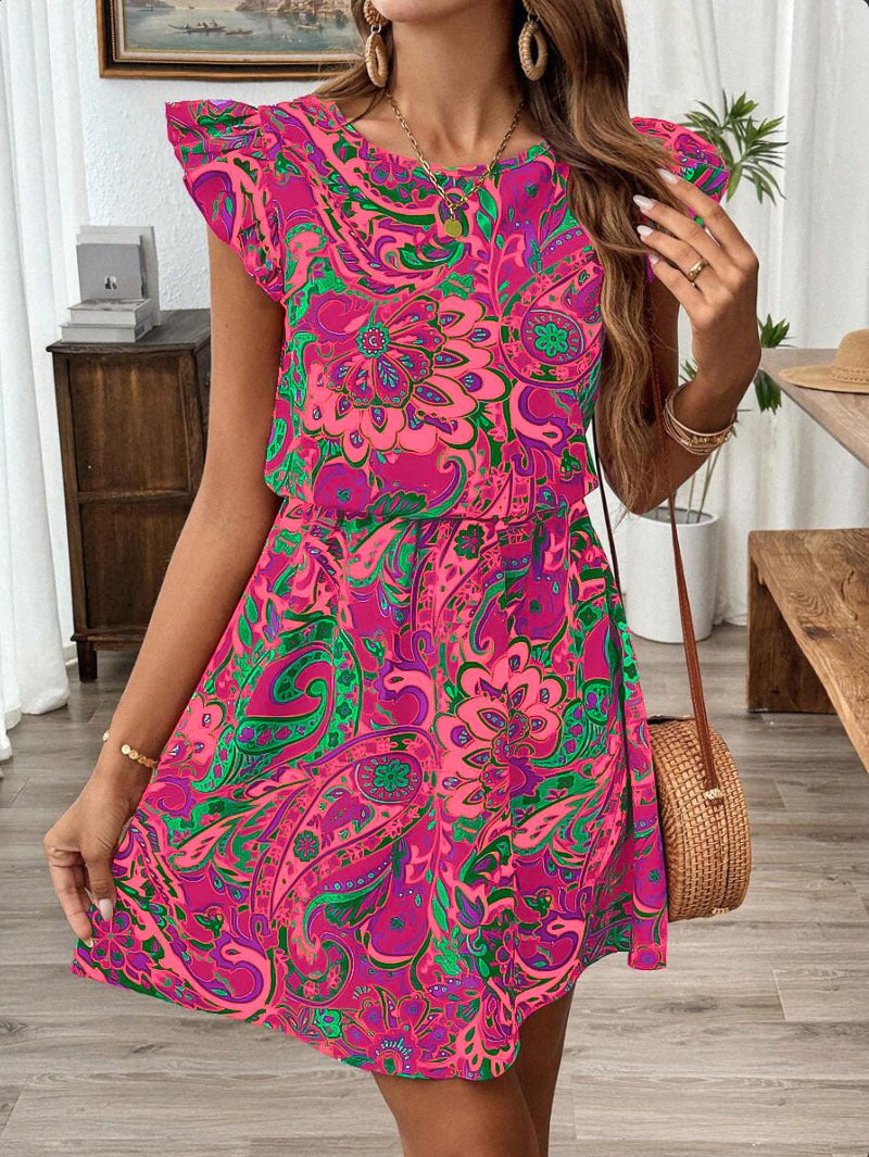 Airy summer dress for women with a playful paisley pattern and ruffle details Lune London