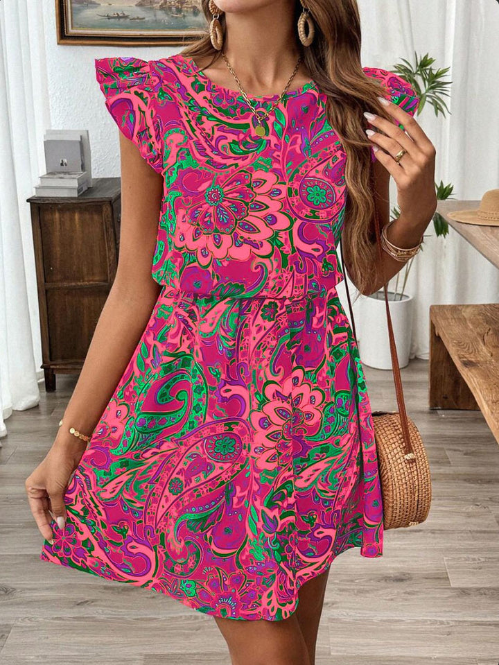 Airy summer dress for women with a playful paisley pattern and ruffle details Lune London