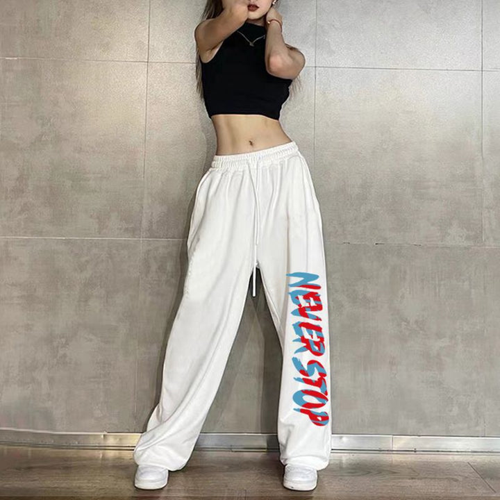 Women’s leisure pants with elastic waistband and creative print Chic & Stil