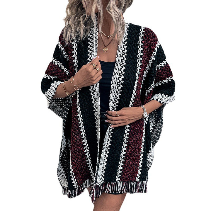 Knit poncho for women with V-neck and fringes Lune London