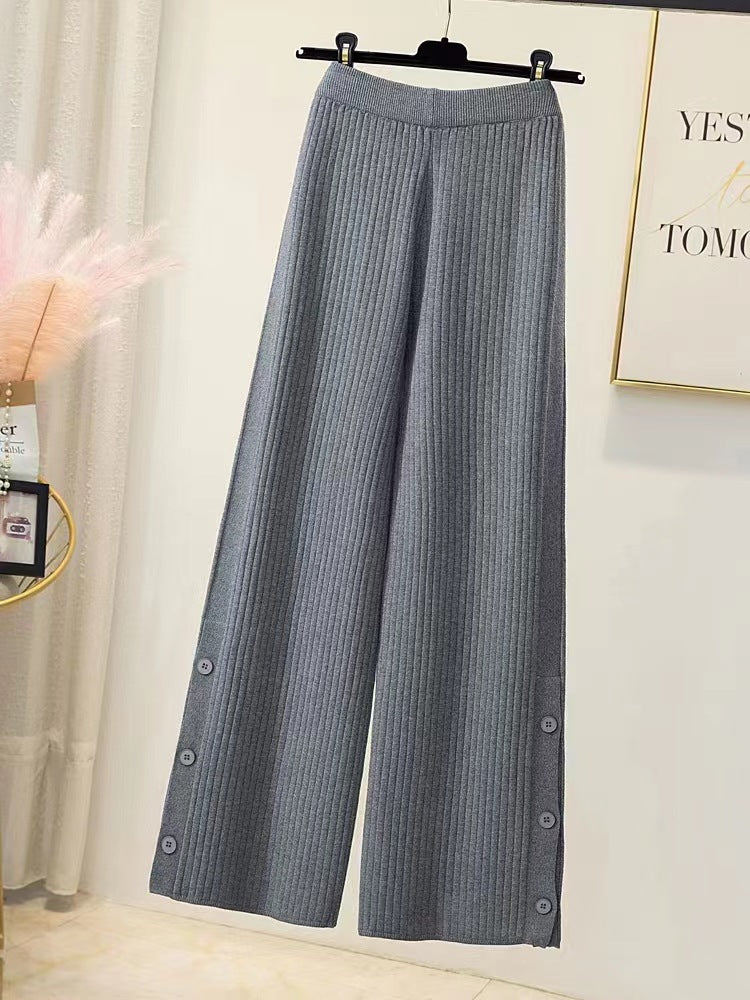 Pleated palazzo pants for women with button details Lune London