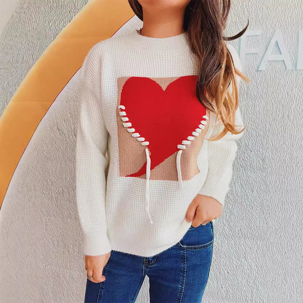 Pull féminin à la mode avec appliqué en forme de cœur et cordon de serrage à l'arrière Chic & Stil