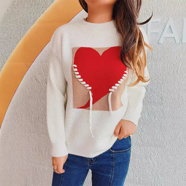 Pull féminin à la mode avec appliqué en forme de cœur et cordon de serrage à l'arrière Chic & Stil