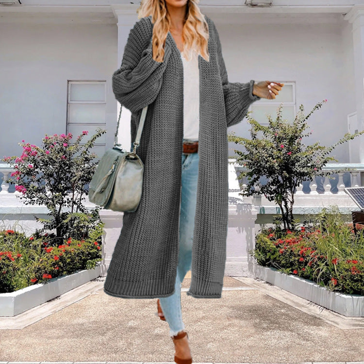 Women’s knit coat with open design and voluminous sleeves Lune London