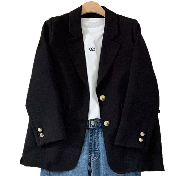 Blazer féminin chic avec tissu texturé et détails de bouton élégants Chic & Stil