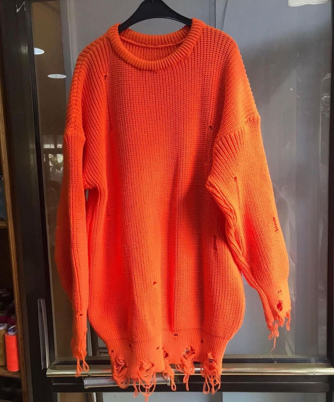 Women Large knit sweater with torn hem Lune London