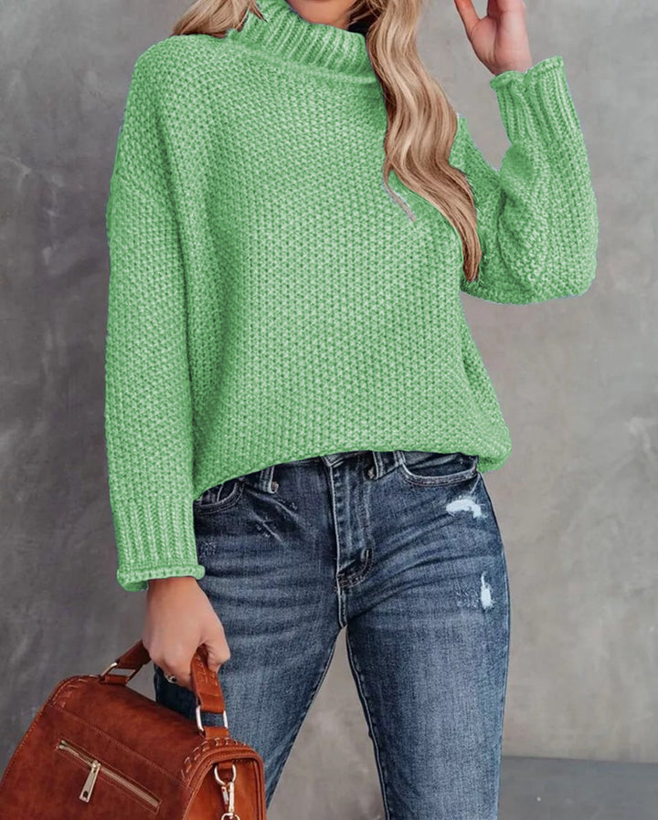 Comfortable knitted sweater for women with a high collar and airy structure Lune London