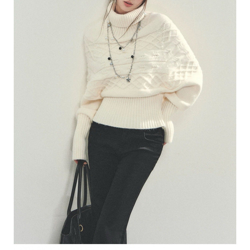 Pull en tricot pour femmes avec coupe oversized et col roulé Chic & Stil