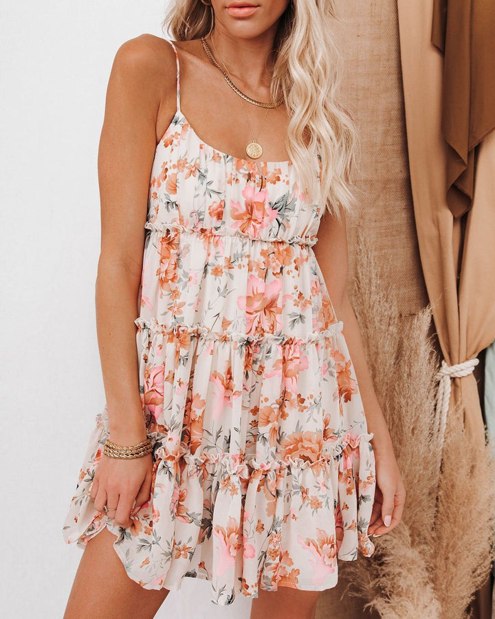 Ladies summer ruffled dress with floral accents and adjustable spaghetti straps Lune London