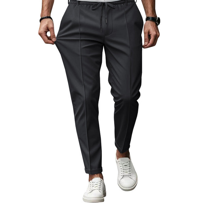 Men's fashionable sports pants with elastic waistband and practical welt pockets Lune London