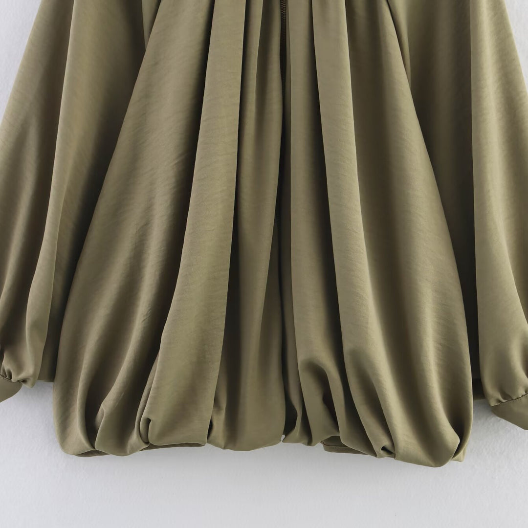 Oversized blouse for women with refined draping and an elegant button detail Lune London