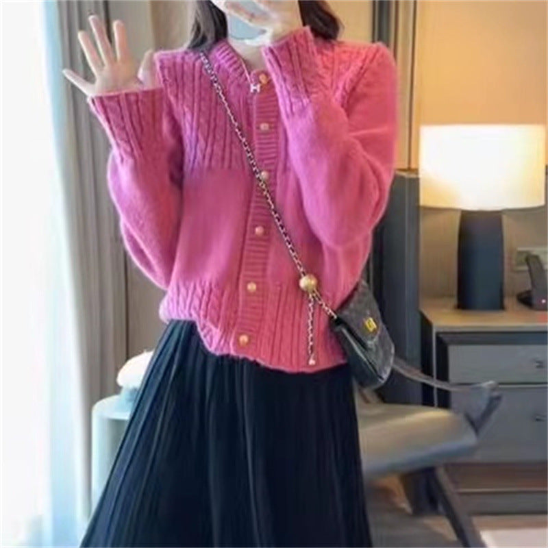 Ladies cozy knit pullover with cable texture and chic gold button details