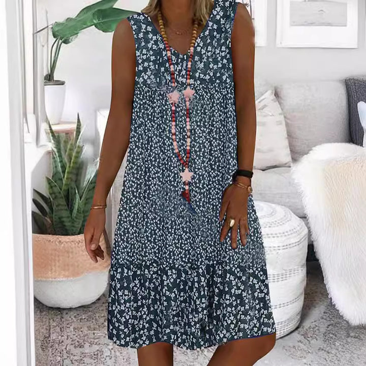 Airy summer dress for women with a playful floral pattern and a fluid silhouette Lune London