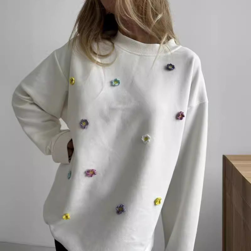 Women comfortable sweatshirt with colorful floral applications Lune London