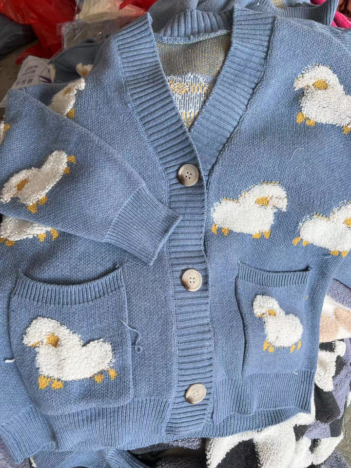 Women’s knit jacket with playful sheep pattern and pockets Lune London