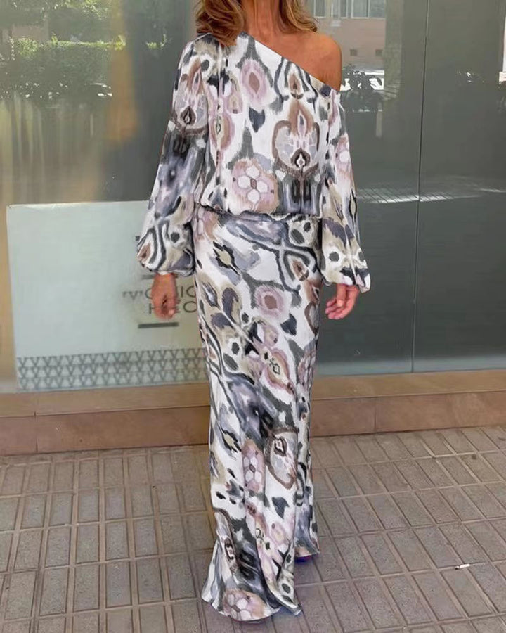Robe maxi élégante pour femmes à coupe asymétrique avec manches lisses Chic & Stil