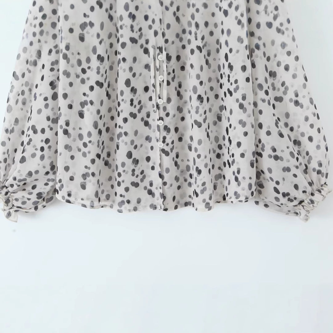 Blouse élégante pour femmes avec col demi et manches aérées Chic & Stil