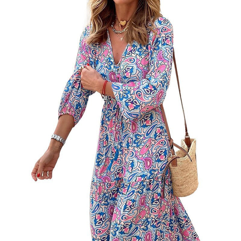 Maxi dress for women with a delicate paisley pattern and an elegant button placket Lune London