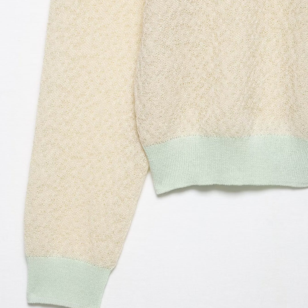 Knitted jacket for women with a delicate pattern and contrasting color details Lune London