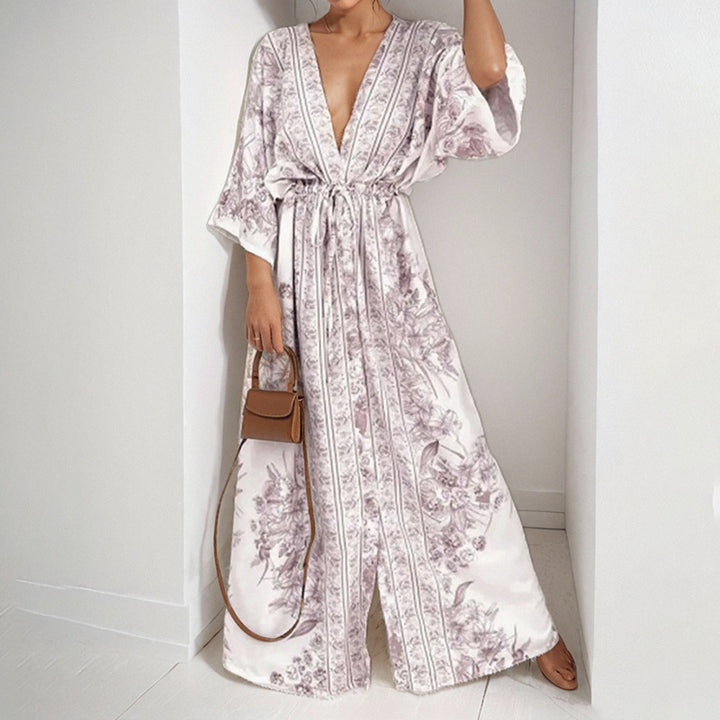 Robe maxi fluide pour femmes avec design floral et manches amples Chic & Stil