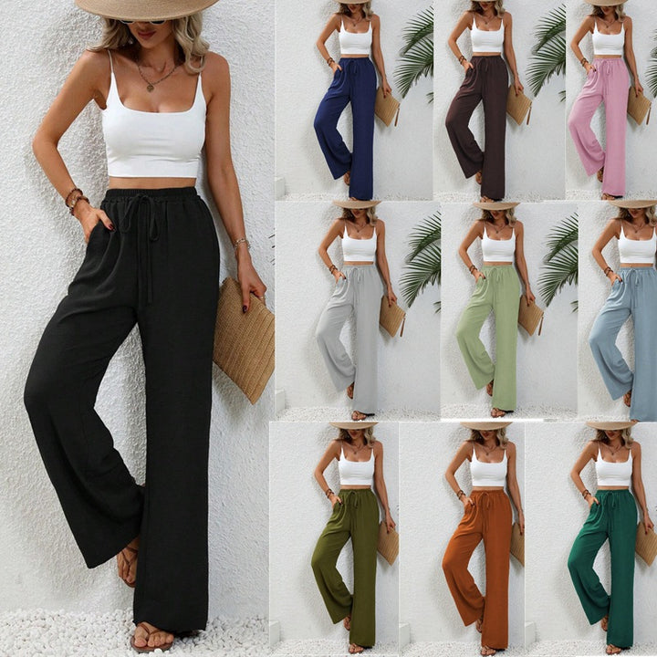 Pantalons larges d'été pour femmes avec taille élastique et poches latérales pratiques Chic & Stil