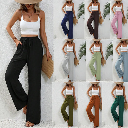 Pantalons larges d'été pour femmes avec taille élastique et poches latérales pratiques Chic & Stil