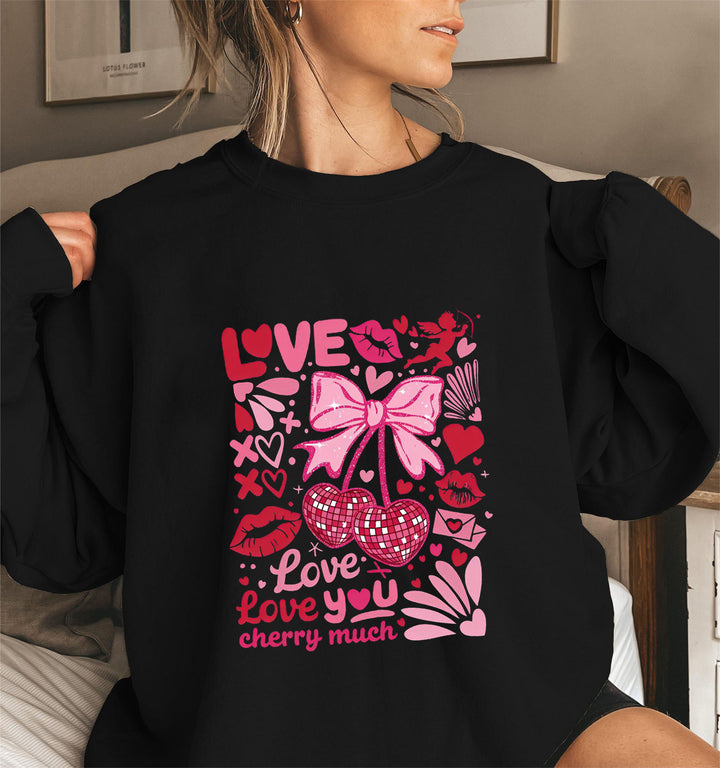 Sweat-shirt pour femmes avec des manches volumineuses et un motif cerise ludique Chic & Stil