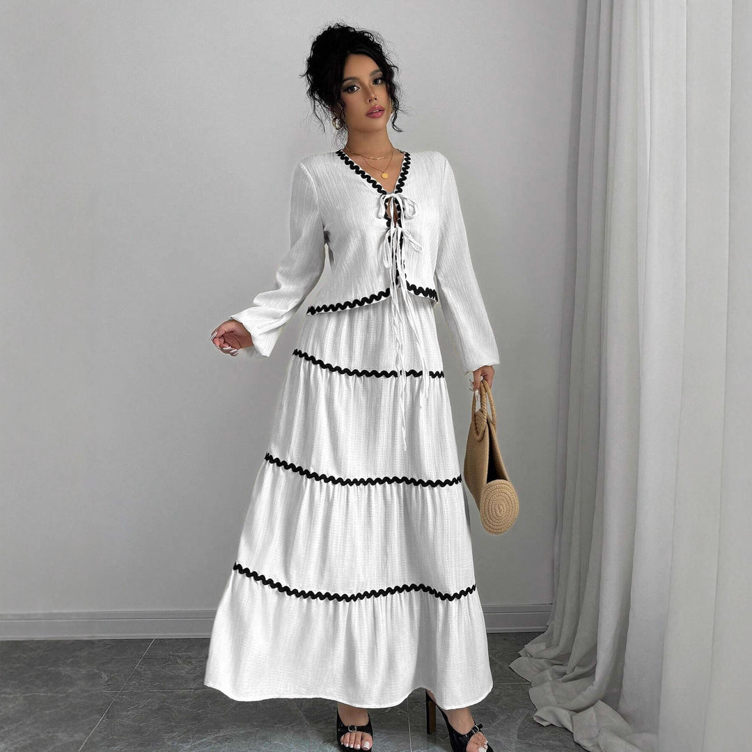 Maxi dress for women with playful lace-up neckline and elegant ruffled skirt Lune London