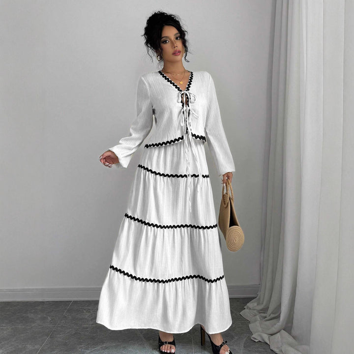 Maxi dress for women with playful lace-up neckline and elegant ruffled skirt Lune London