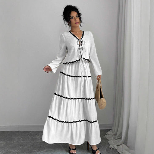 Maxi dress for women with playful lace-up neckline and elegant ruffled skirt Lune London