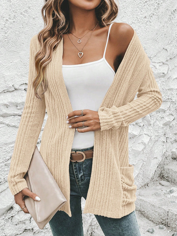 Women's knitted jacket with long sleeves and side pockets Lune London