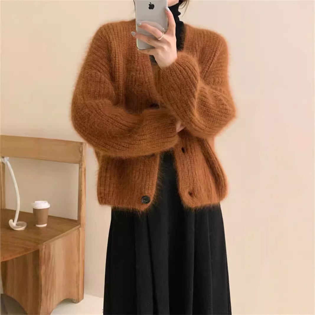 Cardigan tricoté confortable pour femmes avec un matériau exceptionnellement doux et une fermeture à boutons pratique Chic & Stil