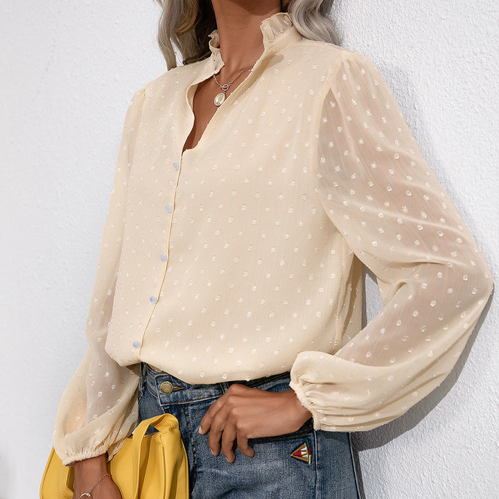 Ruffled blouse for women with sheer sleeves and a fine polka dot pattern Lune London