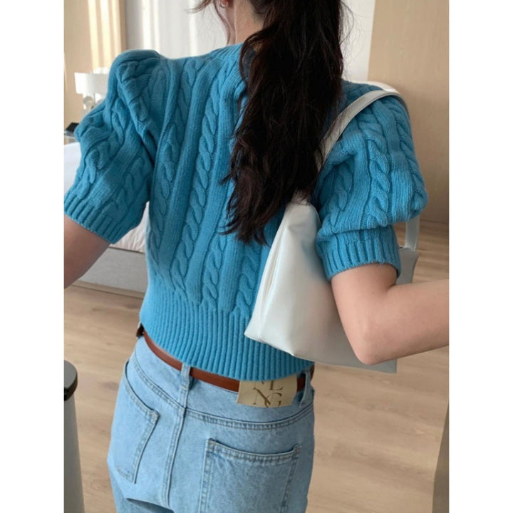 Knitted sweater for women with voluminous sleeves and cable knit pattern Lune London