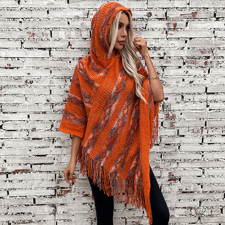 Ladies knitted poncho with hood and fringe design Lune London