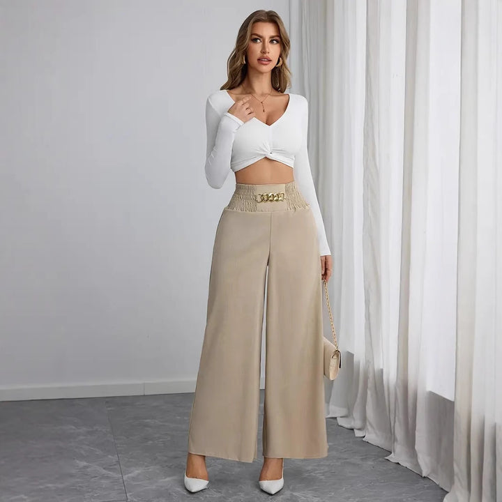 Wide palazzo trousers for women with elastic waistband and decorative belt Lune London