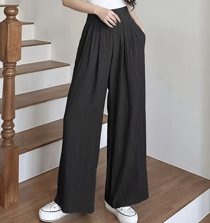 Wide pleated trousers for women with high pockets and elastic waist Lune London