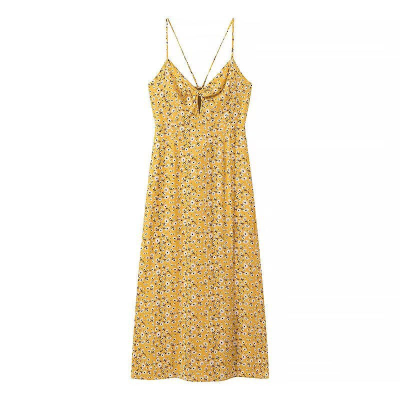 Summer dress for women with a lovely floral print and playful straps Lune London