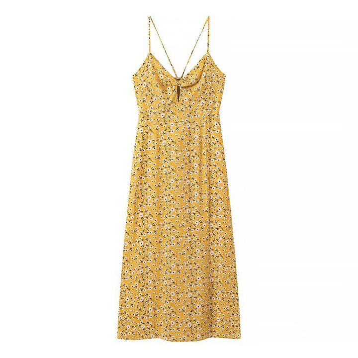 Summer dress for women with a lovely floral print and playful straps Lune London