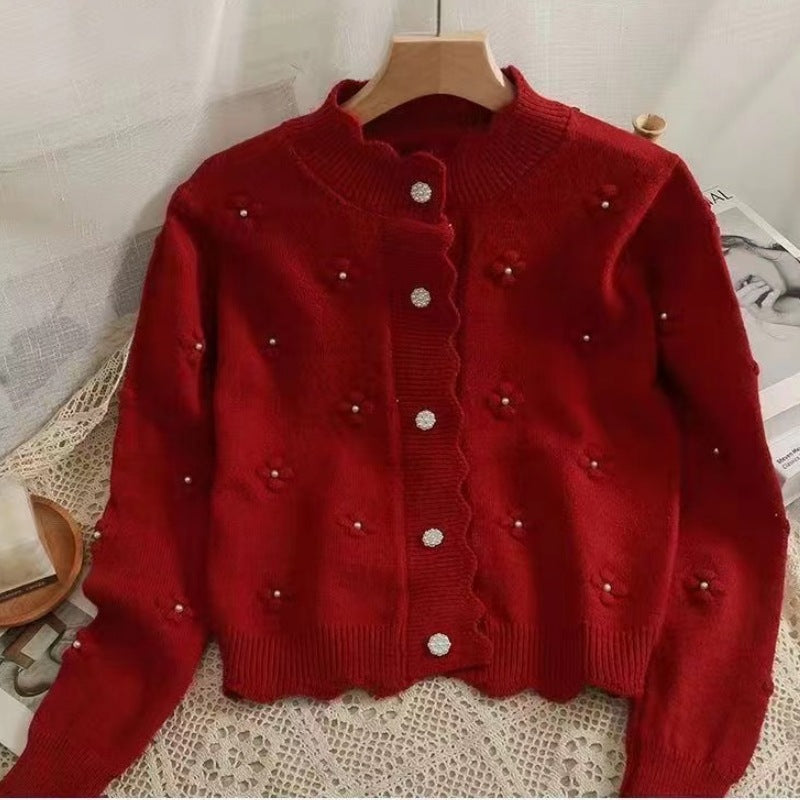 Cardigan féminin confortable avec des appliqués floraux Chic & Stil