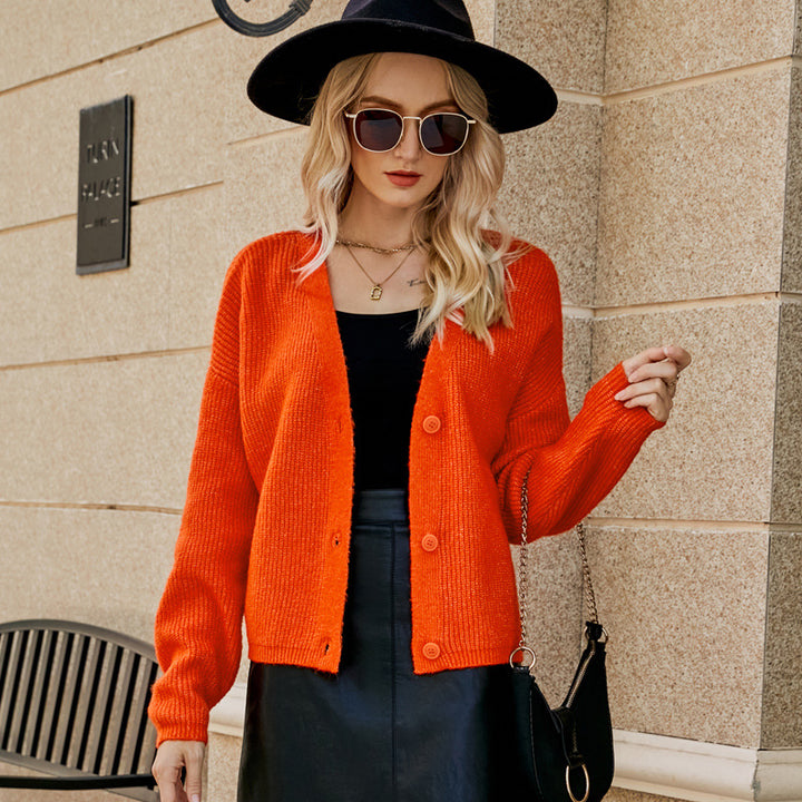 Lightweight knit cardigan for women with deep V-neck and button details Chic und Stil
