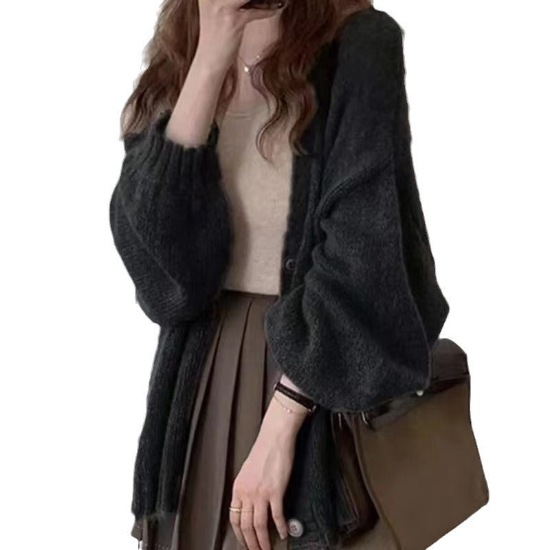 Elegant knit jacket with wide sleeves and refined details Lune London