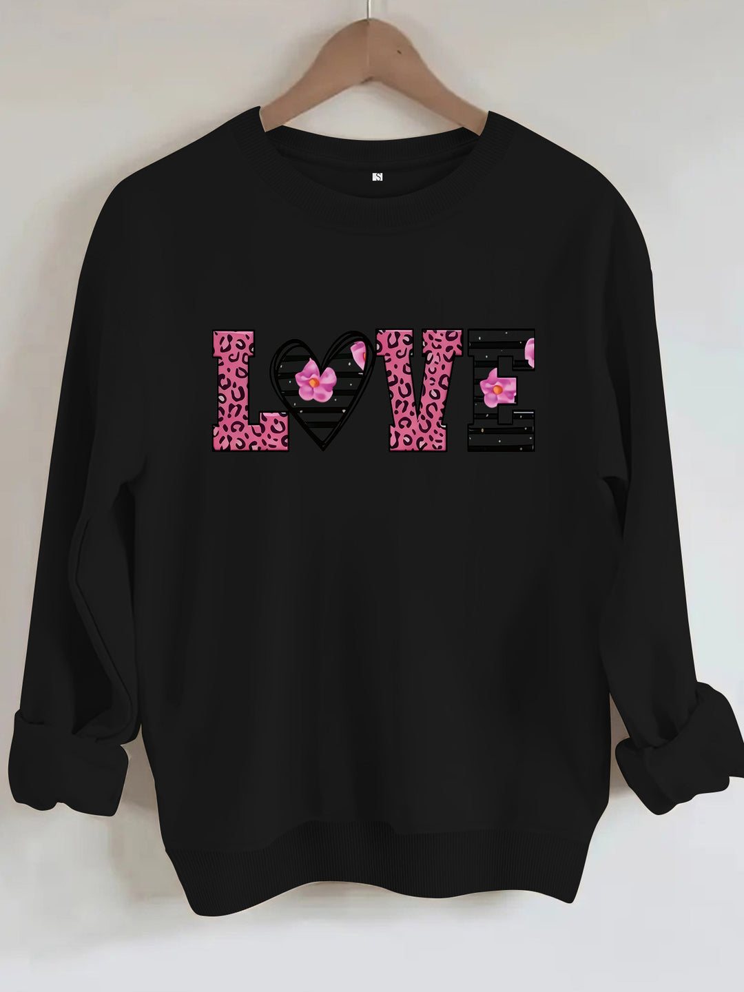 Sweatshirt femme avec design moderne de cœur léopard et coupe confortable Chic & Stil