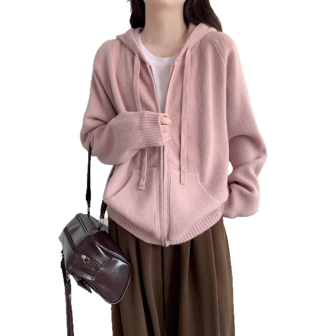 Veste à capuche pour femmes surdimensionnée avec une coupe courte et des poches pratiques Chic & Stil