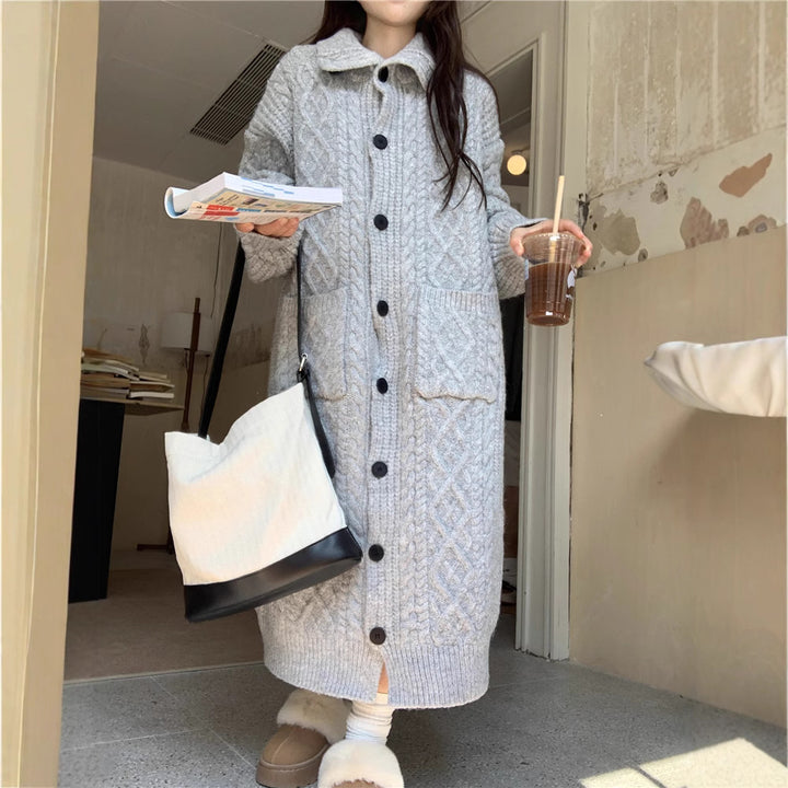 Thick knit button coat for ladies with an elegant cable pattern and practical pockets Lune London
