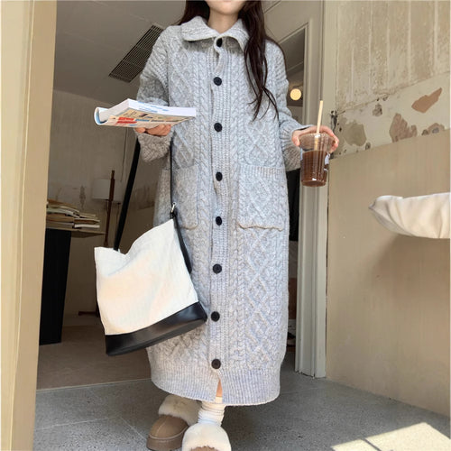 Thick knit button coat for ladies with an elegant cable pattern and practical pockets Lune London