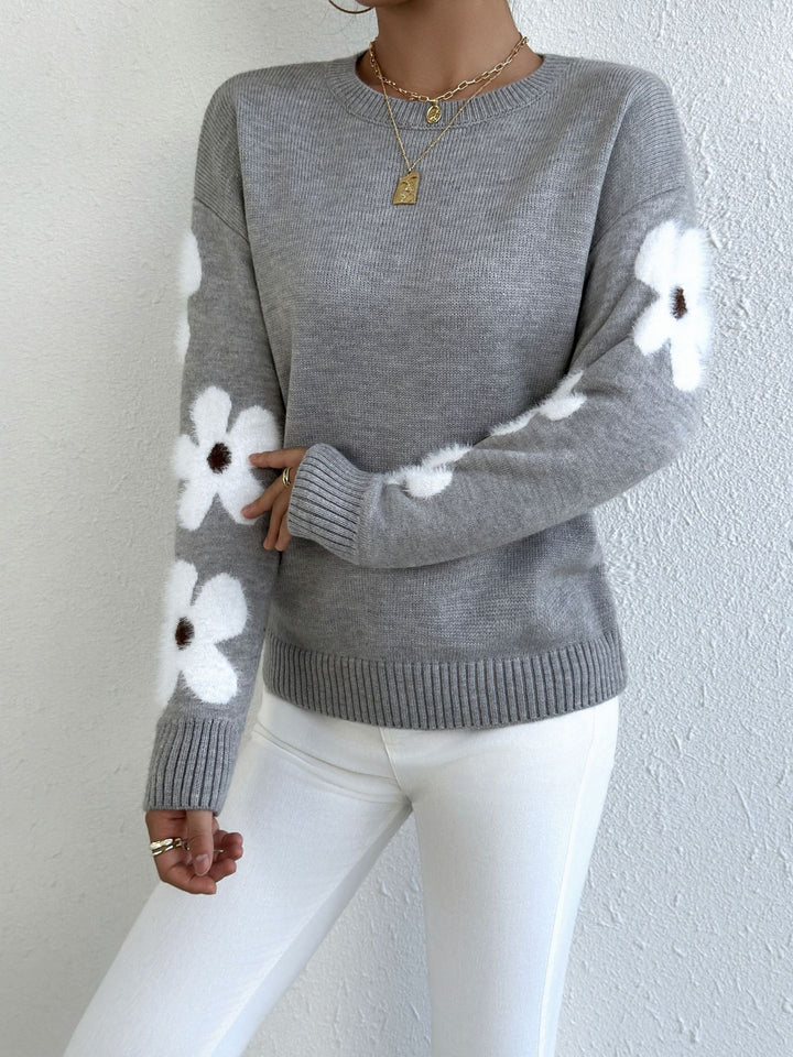 Pull féminin avec motif floral et jersey texturé Chic & Stil